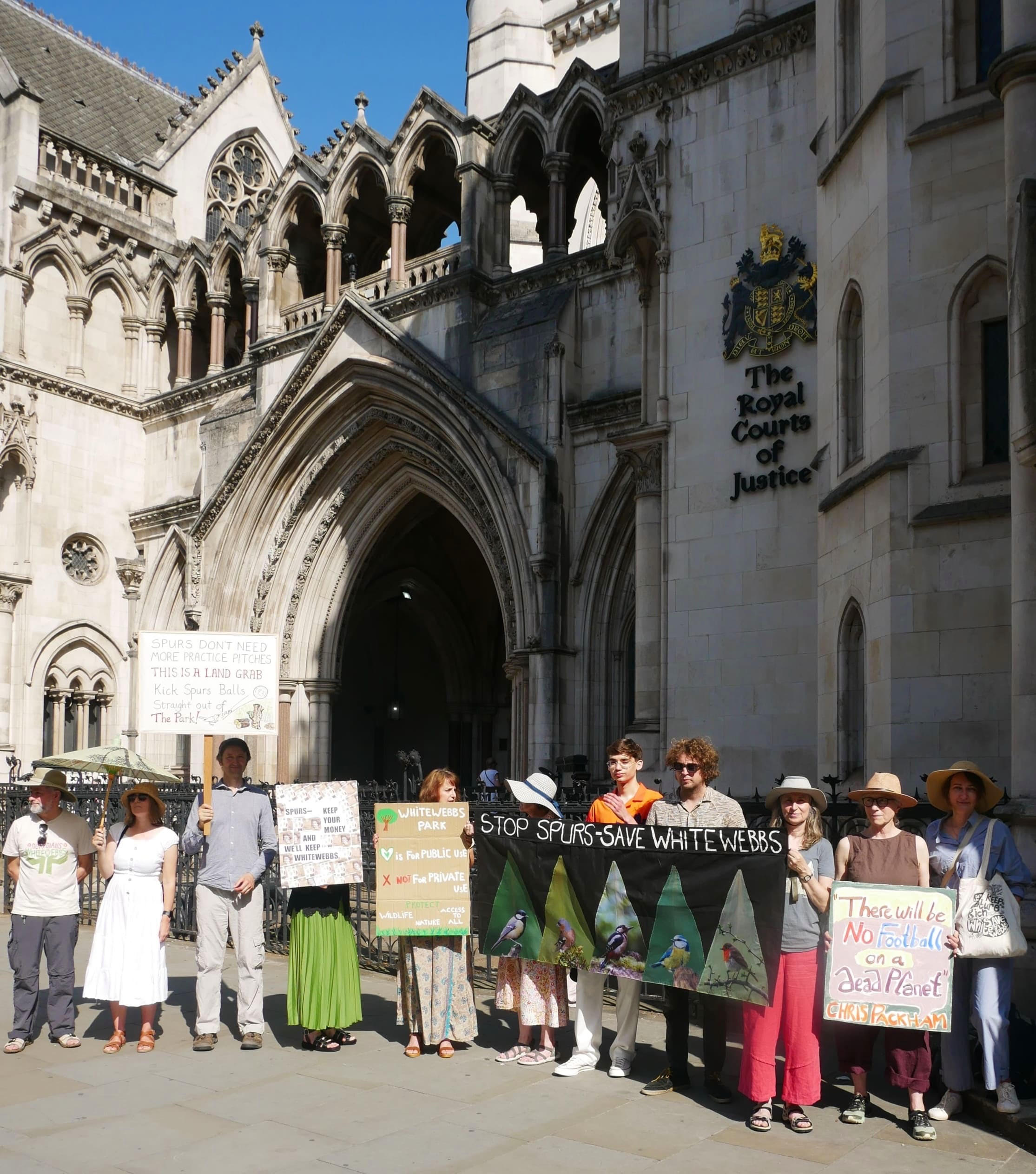 Guardians of Whitewebbs with banner and placards outside the Royal Courts of Justice
